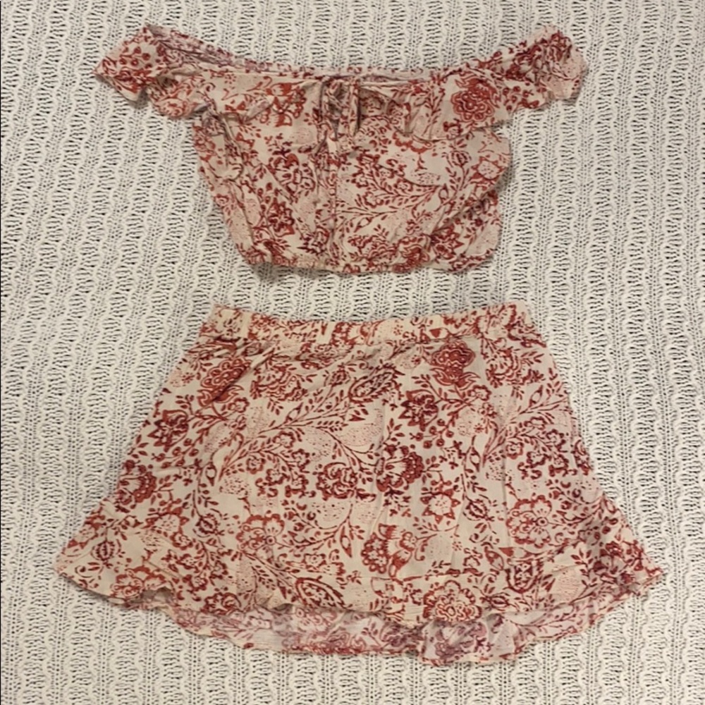 Off the shoulder crop top and matching mini skirt